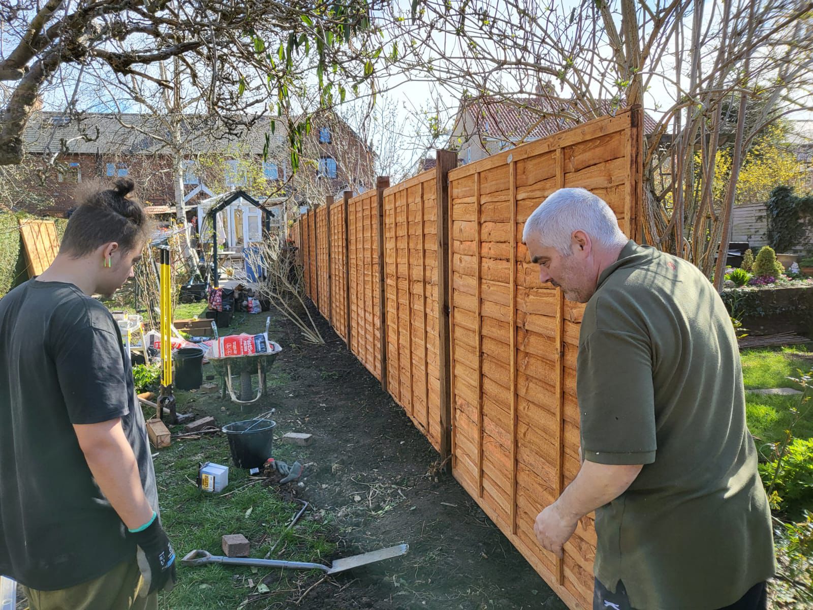 Timber fence installation in a Suffolk garden